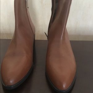 Tan leather ankle boots, low heel 2inches. Never worn.
